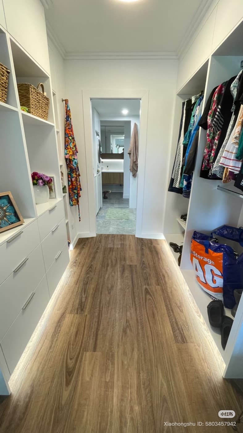 Warm LED strip lighting installed in a walk-in wardrobe